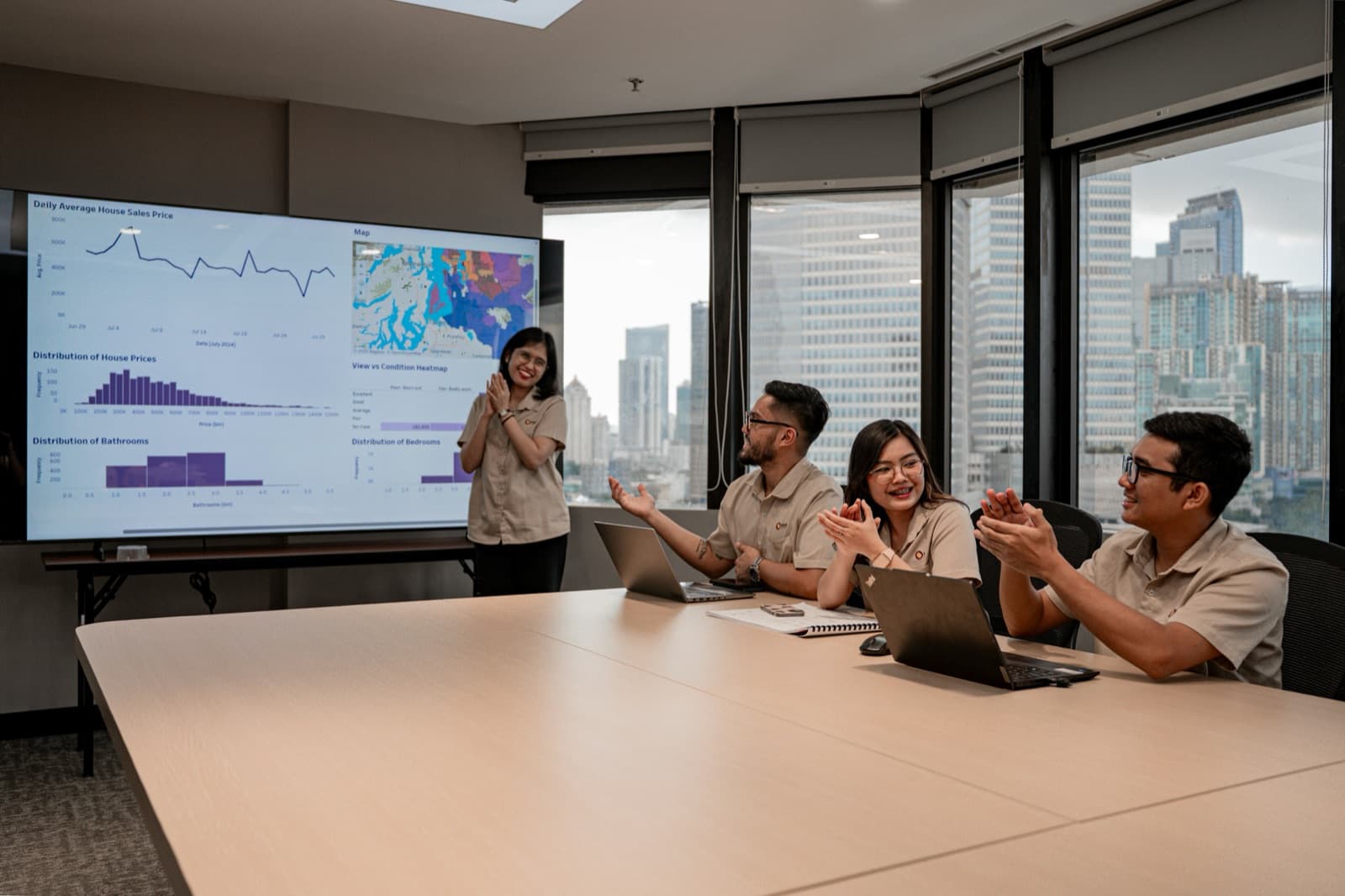 Presenting data on a screen to colleagues in an office