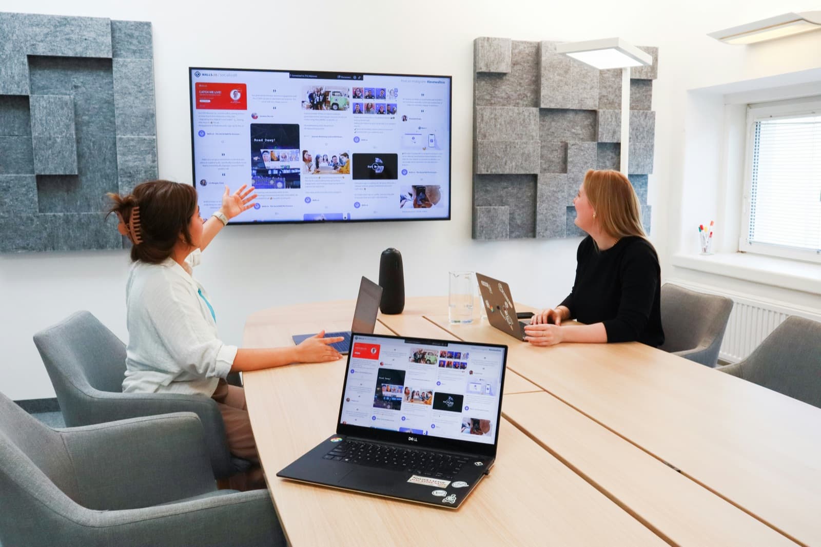 Team watching a presentation in a meeting room